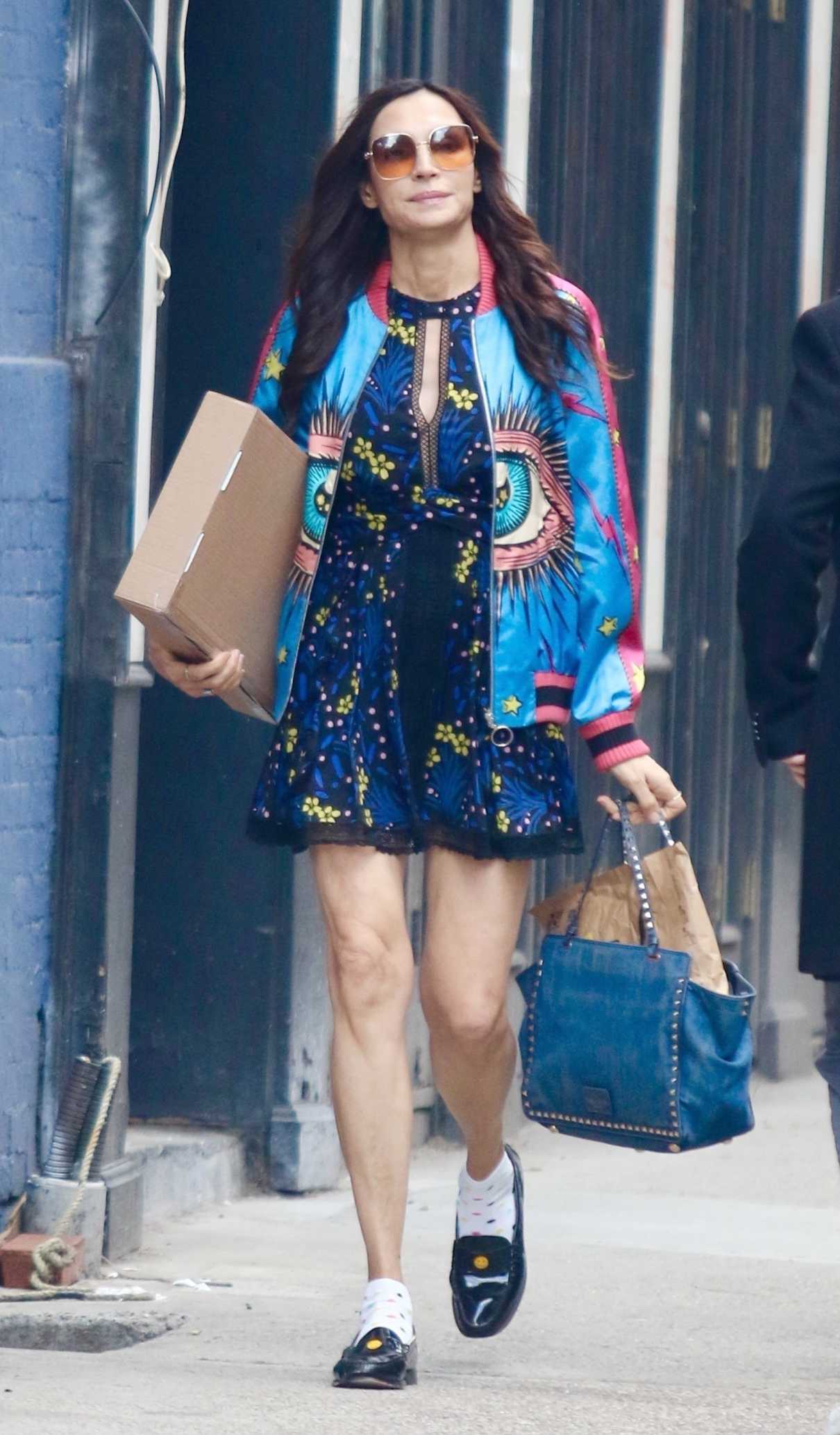 Famke Janssen in a Blue Mini Dress Was Seen Out in New York City 04/14/2025