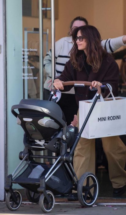 Jenna Coleman in a Beige Pants