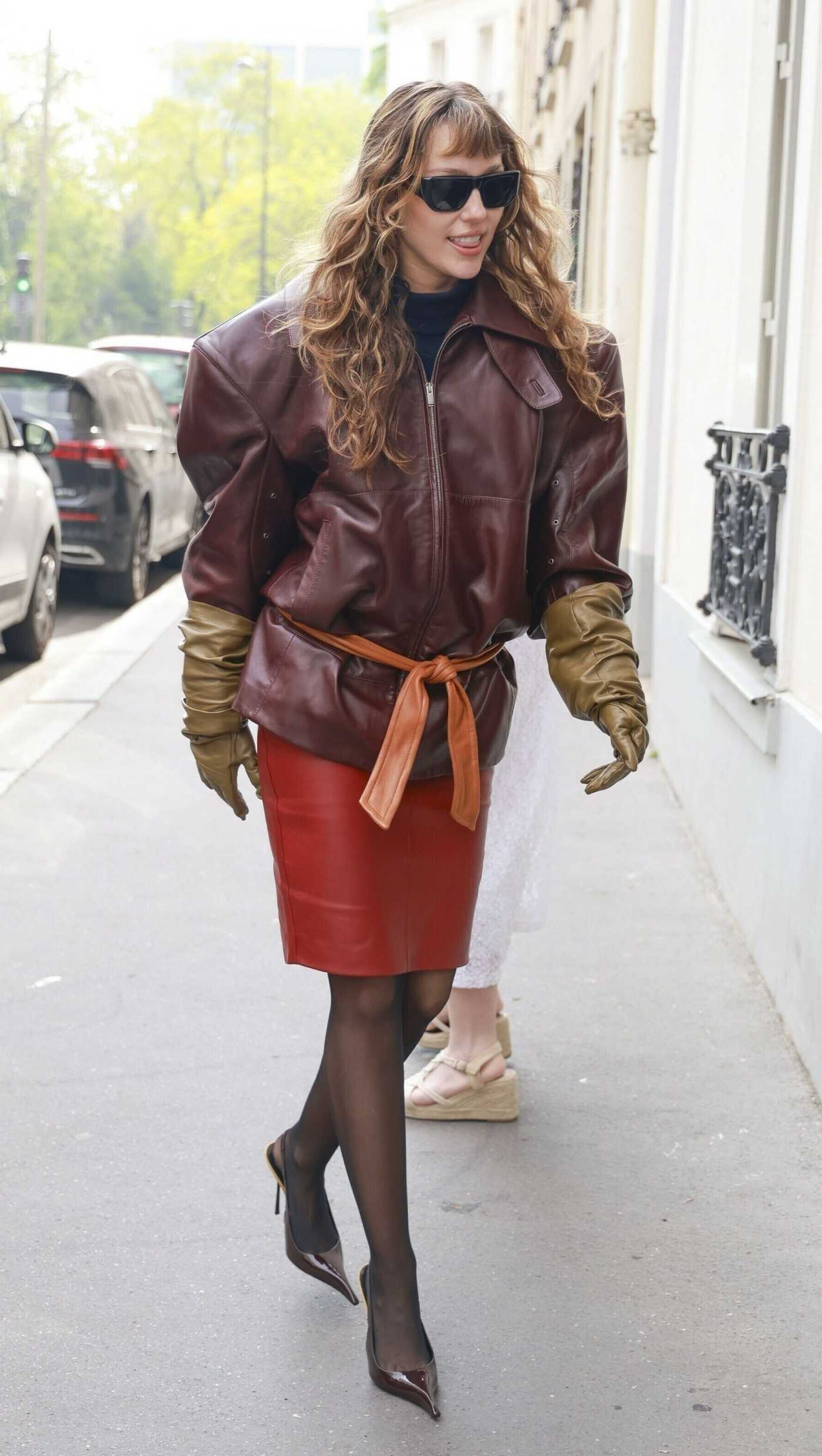 Miley Cyrus in a Brown Leather Jacket Leaves Her Hotel in Paris 04/26/2025