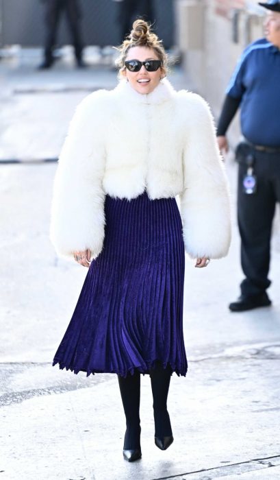 Miley Cyrus in a White Fur Jacket