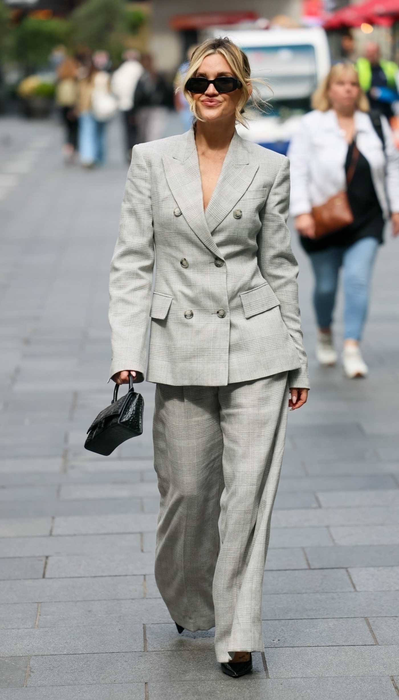 Ashley Roberts in a Grey Pantsuit Leaves the Heart Radio in London 07/07/2025