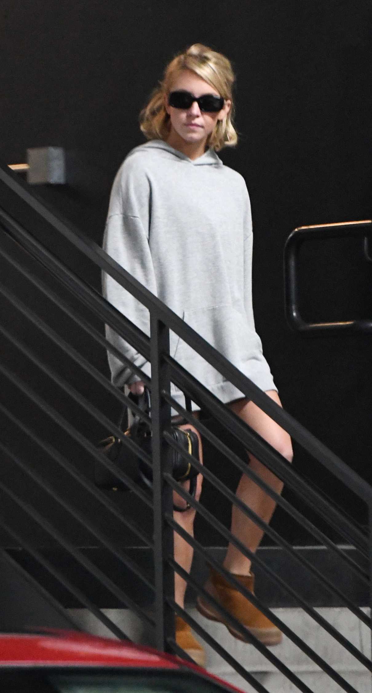 Sydney Sweeney in a Grey Hoodie Leaves the Gym in Los Angeles 11/17/2025