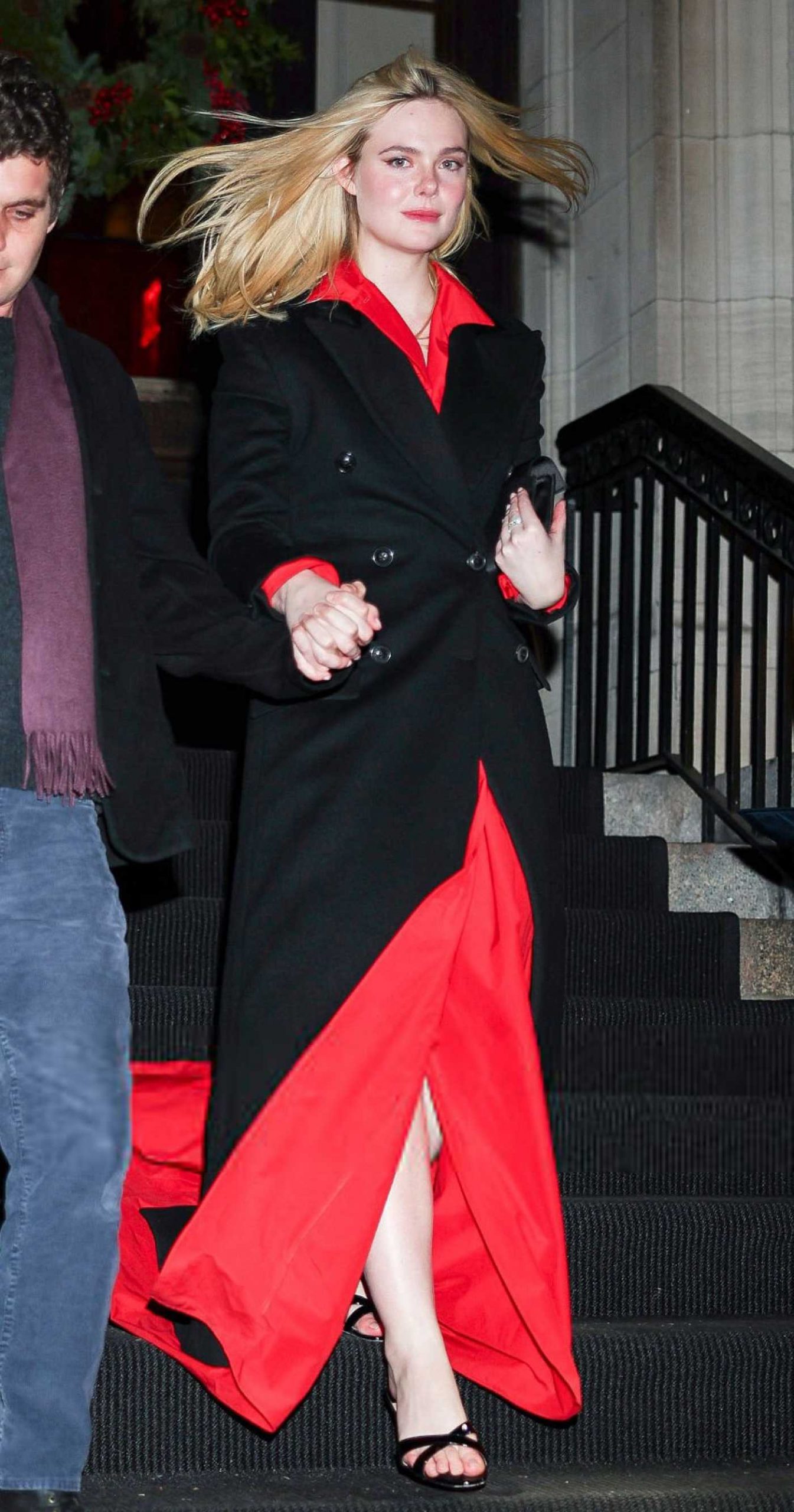 Elle Fanning in a Black Coat Was Seen Out in the West Village in New York City 12/02/2025