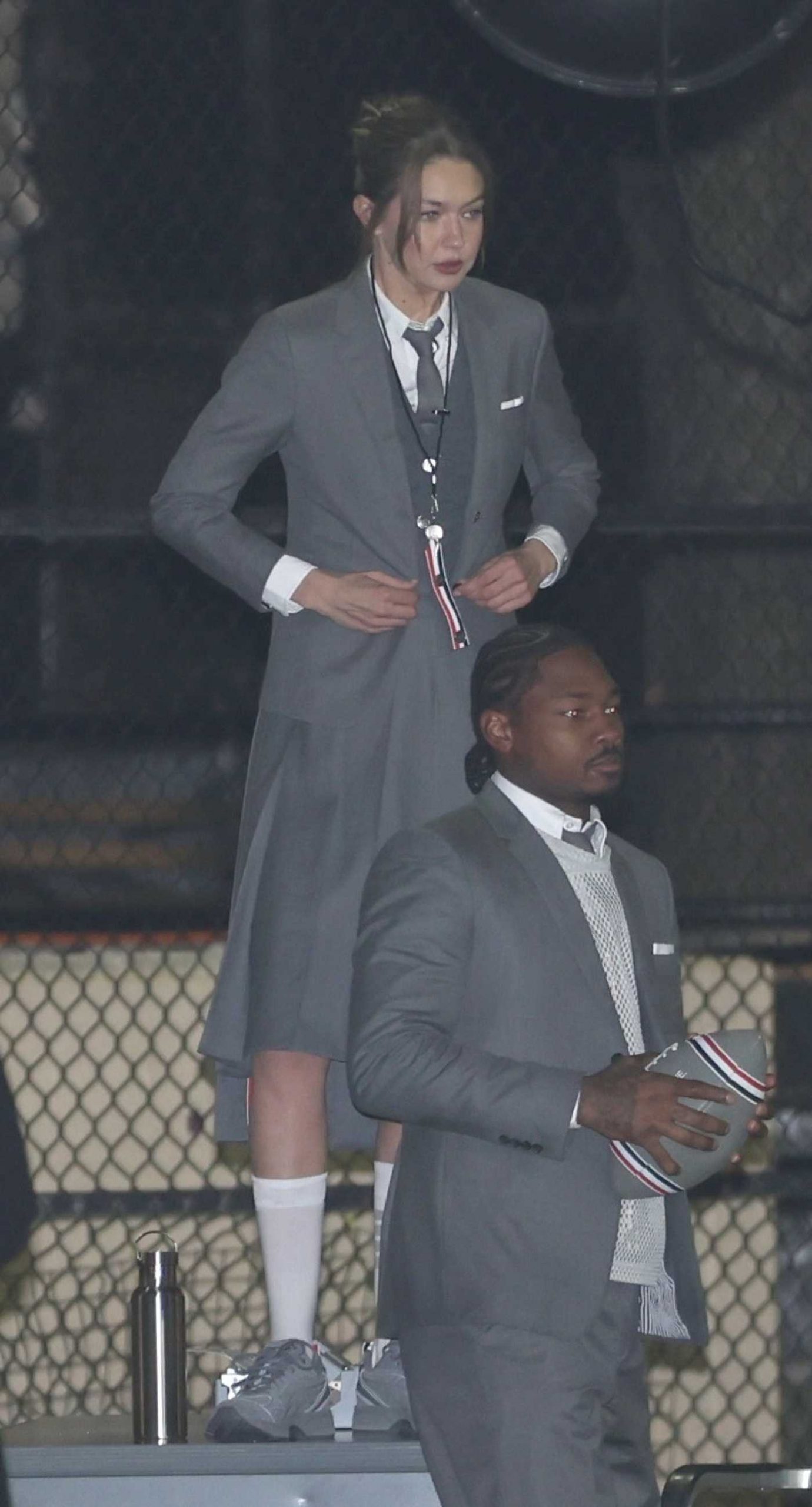 Gigi Hadid in a Grey Ensemble Films GQ Bowl x Thom Browne Commercial in New York 12/17/2025
