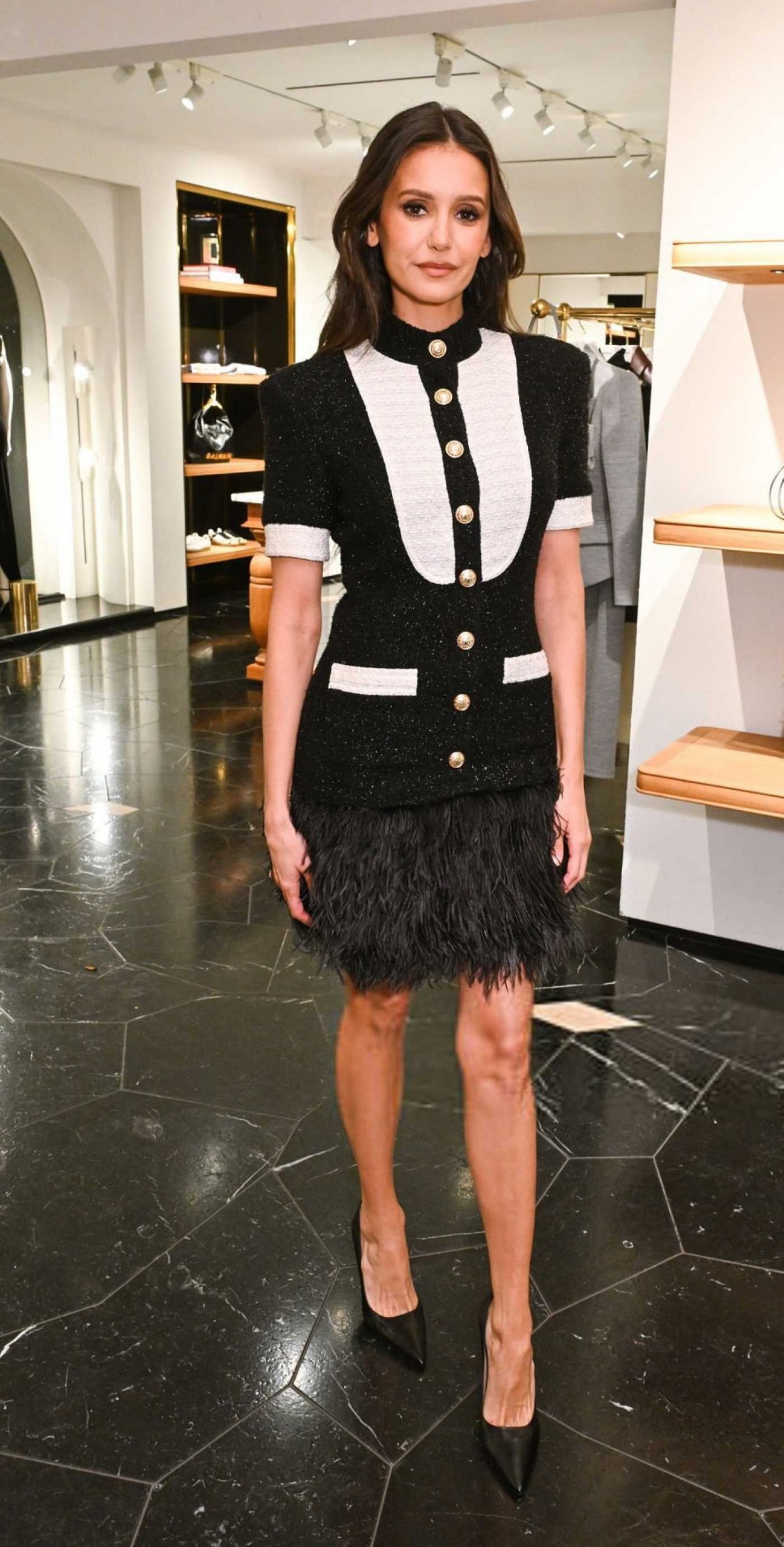 Nina Dobrev Attends as Balmain Paris Hosts COSF Holiday Shopping Event in Los Angeles 12/10/2025