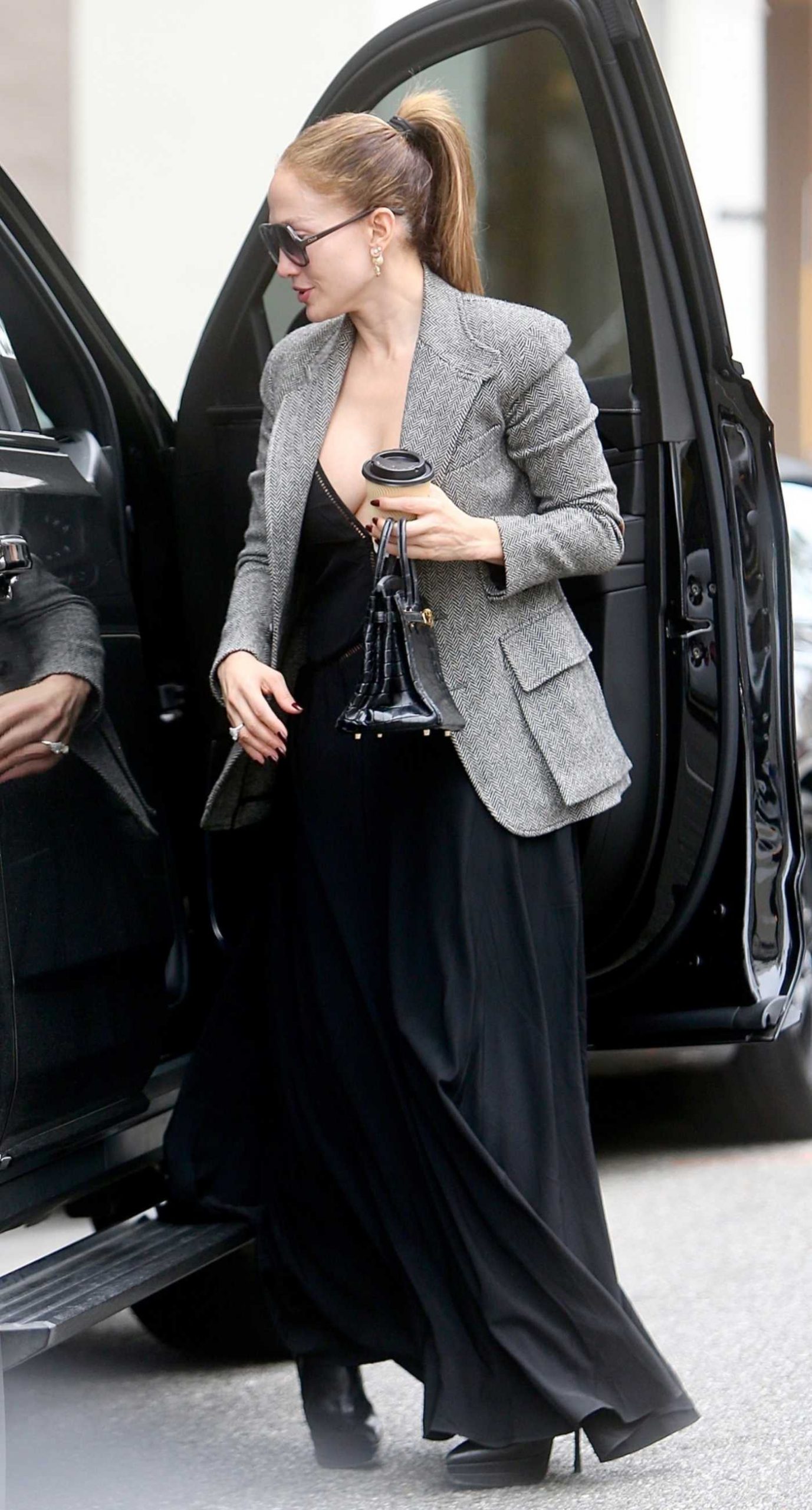 Jennifer Lopez in a Grey Blazer Shops at What Goes Around Comes Around on Rodeo Drive in Beverly Hills 01/22/2026