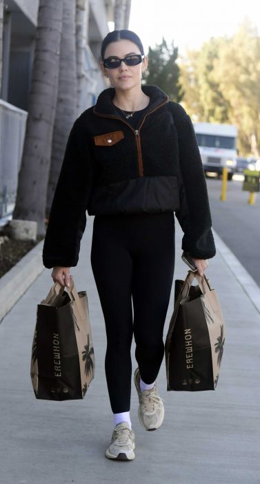 Lucy Hale in a Black Leggings