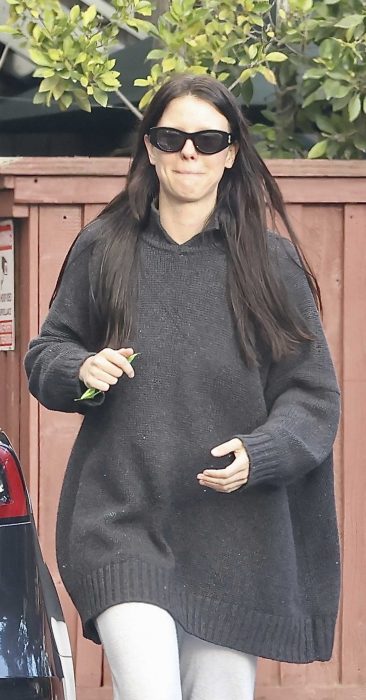 Mia Goth in a Black Sweater
