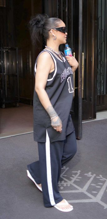 Rihanna in a Black Roc-A-Fella Jersey