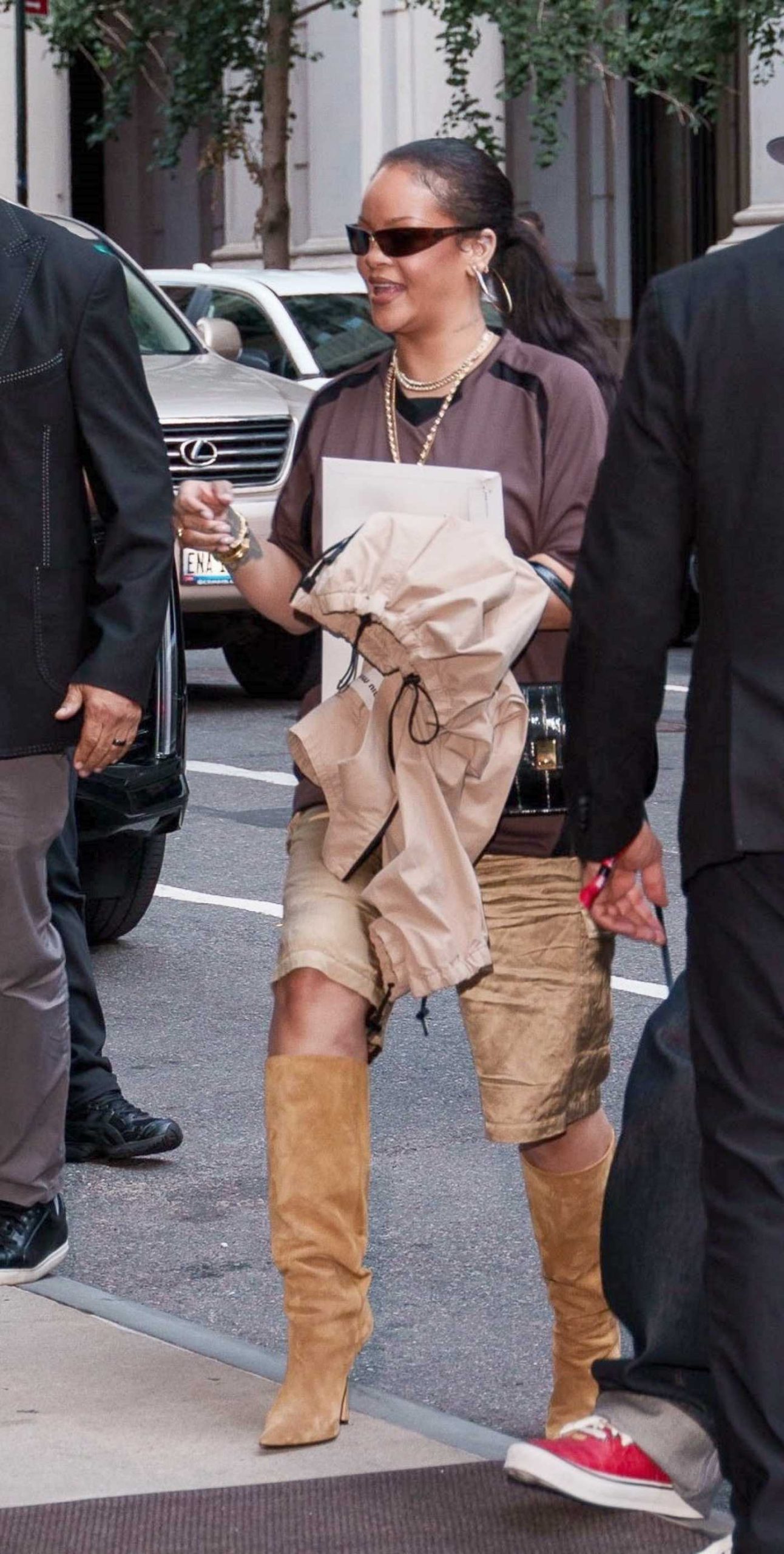 Rihanna in a Brown Tee Arrives with ASAP Rocky at Her Hotel in New York City 07/19/2026