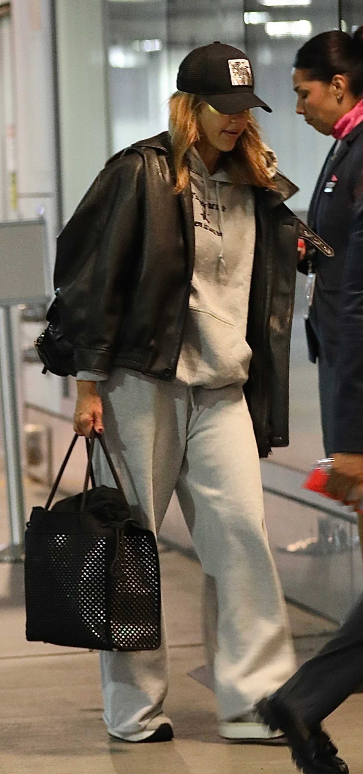 Jessica Alba in a Black Leather Jacket Arrives at LAX Airport in Los Angeles 10/09/2026
